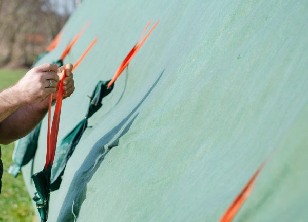 fixing tape, gravel bags, weighted gravel bags